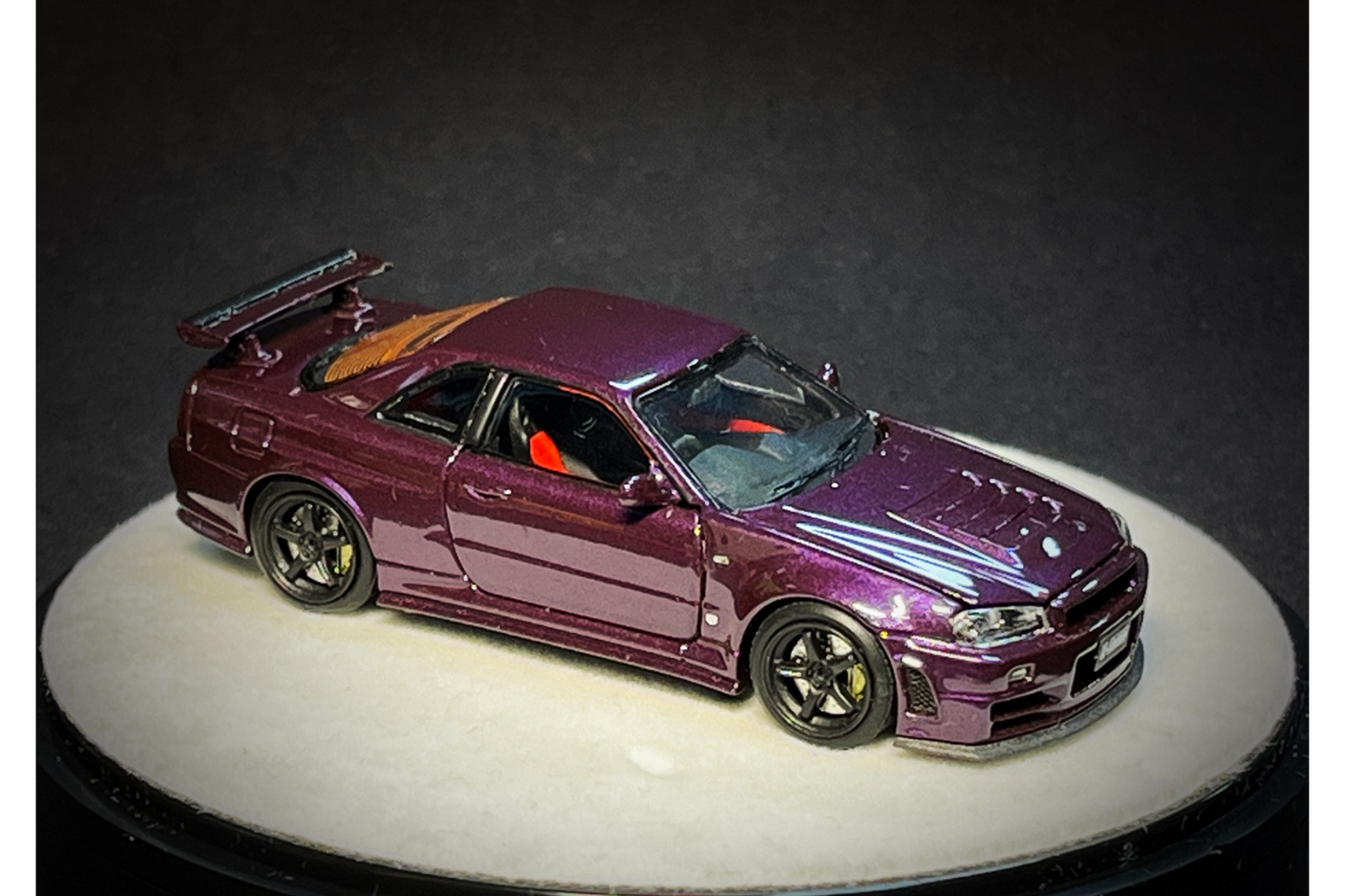 PGM x One Model 1:64 Nissan Skyline GT-R (R34) Z-Tune in Midnight Purple on Luxury Base
