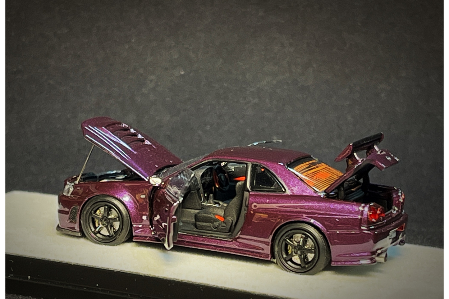 PGM x One Model 1:64 Nissan Skyline GT-R (R34) Z-Tune in Midnight Purple on Standard Base