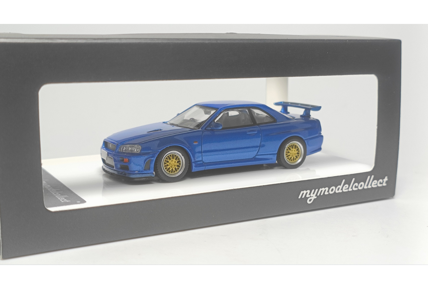 MC 1/64 Nissan Skyline GT-R V-Spec (R34) in Bayside Blue