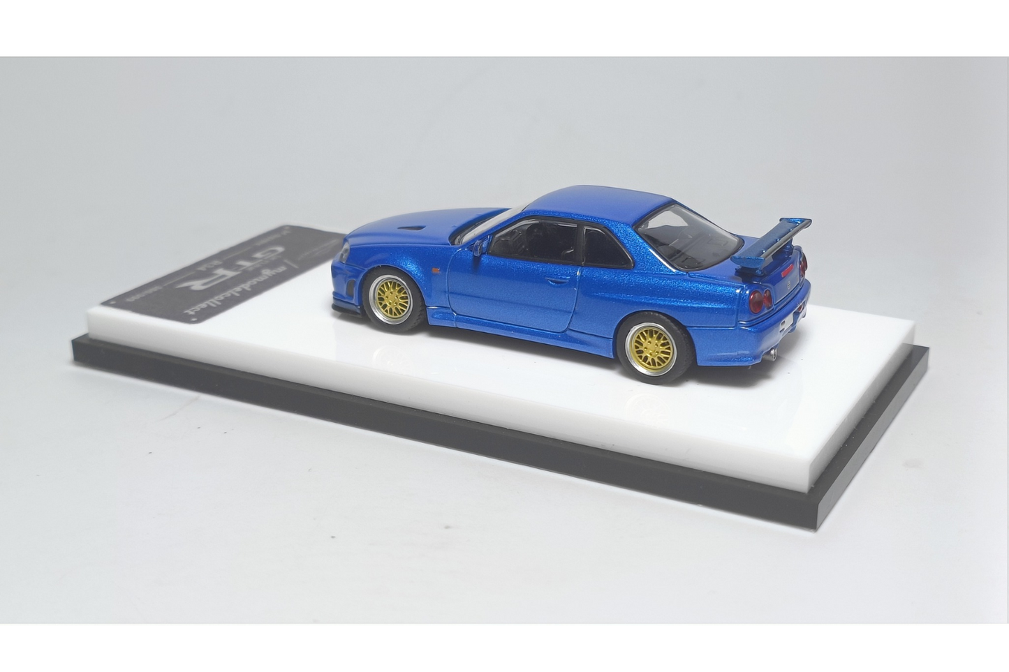 MC 1/64 Nissan Skyline GT-R V-Spec (R34) in Bayside Blue