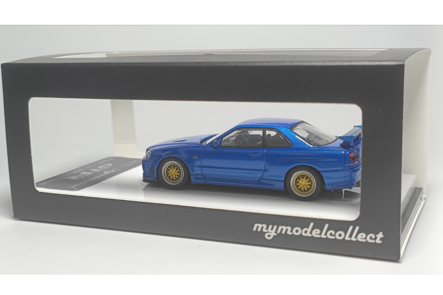 MC 1/64 Nissan Skyline GT-R V-Spec (R34) in Bayside Blue