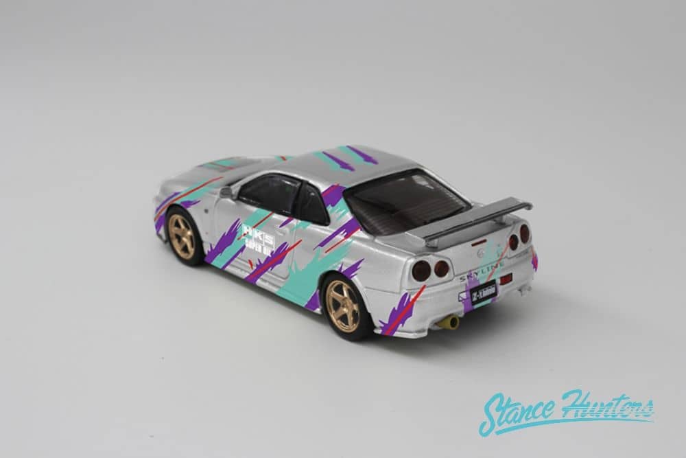 Stance Hunters x ArtWork 1/64 Nissan Skyline GT-R (R34) Nismo Z-Tune in Silver HKS Livery