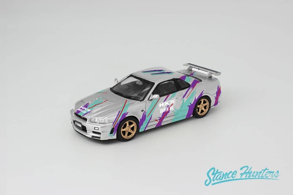 Stance Hunters x ArtWork 1/64 Nissan Skyline GT-R (R34) Nismo Z-Tune in Silver HKS Livery