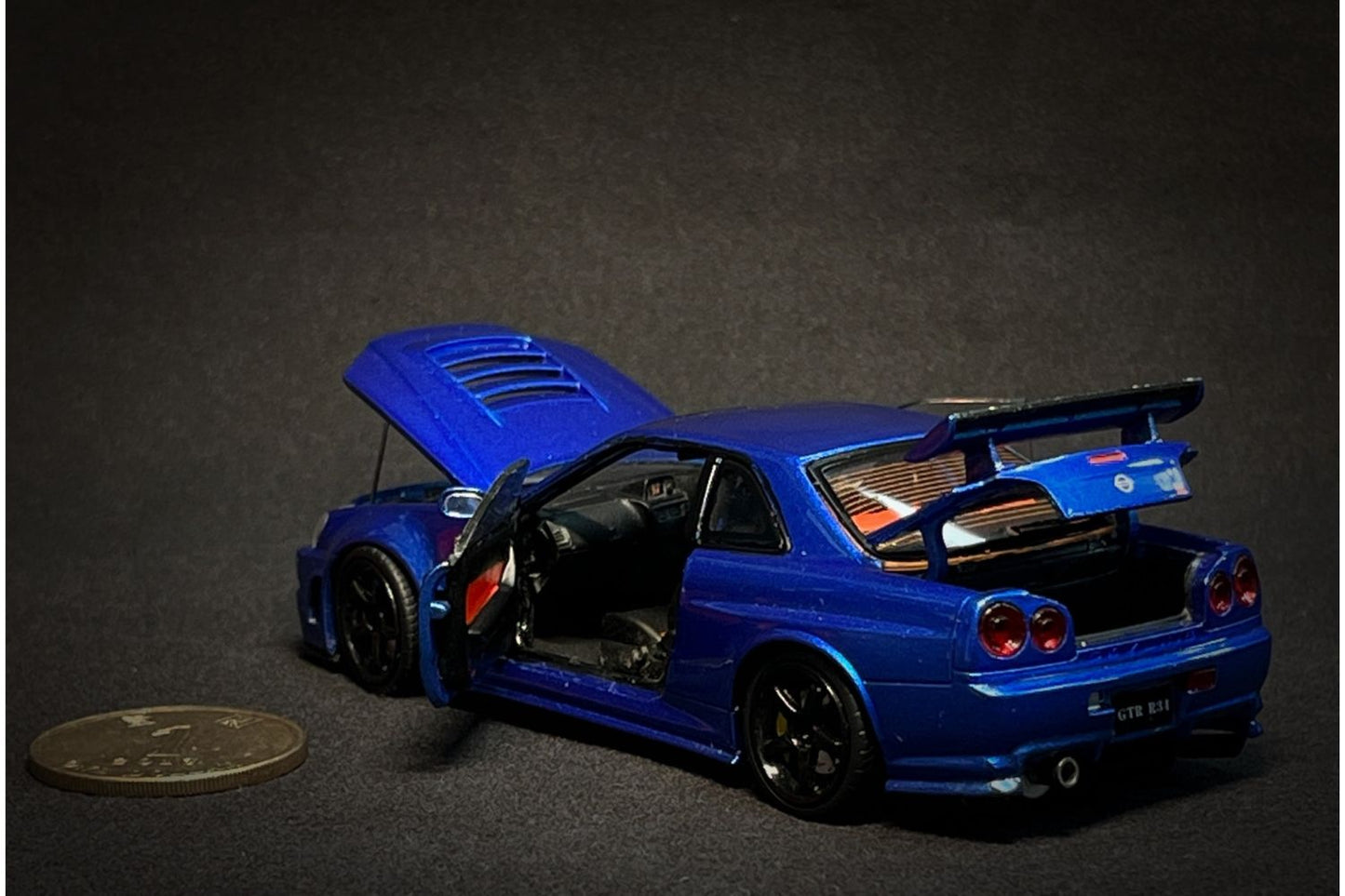 PGM x One Model 1:43 Nissan Skyline GT-R (R34) Z-Tune in Metallic Blue Ordinary Version