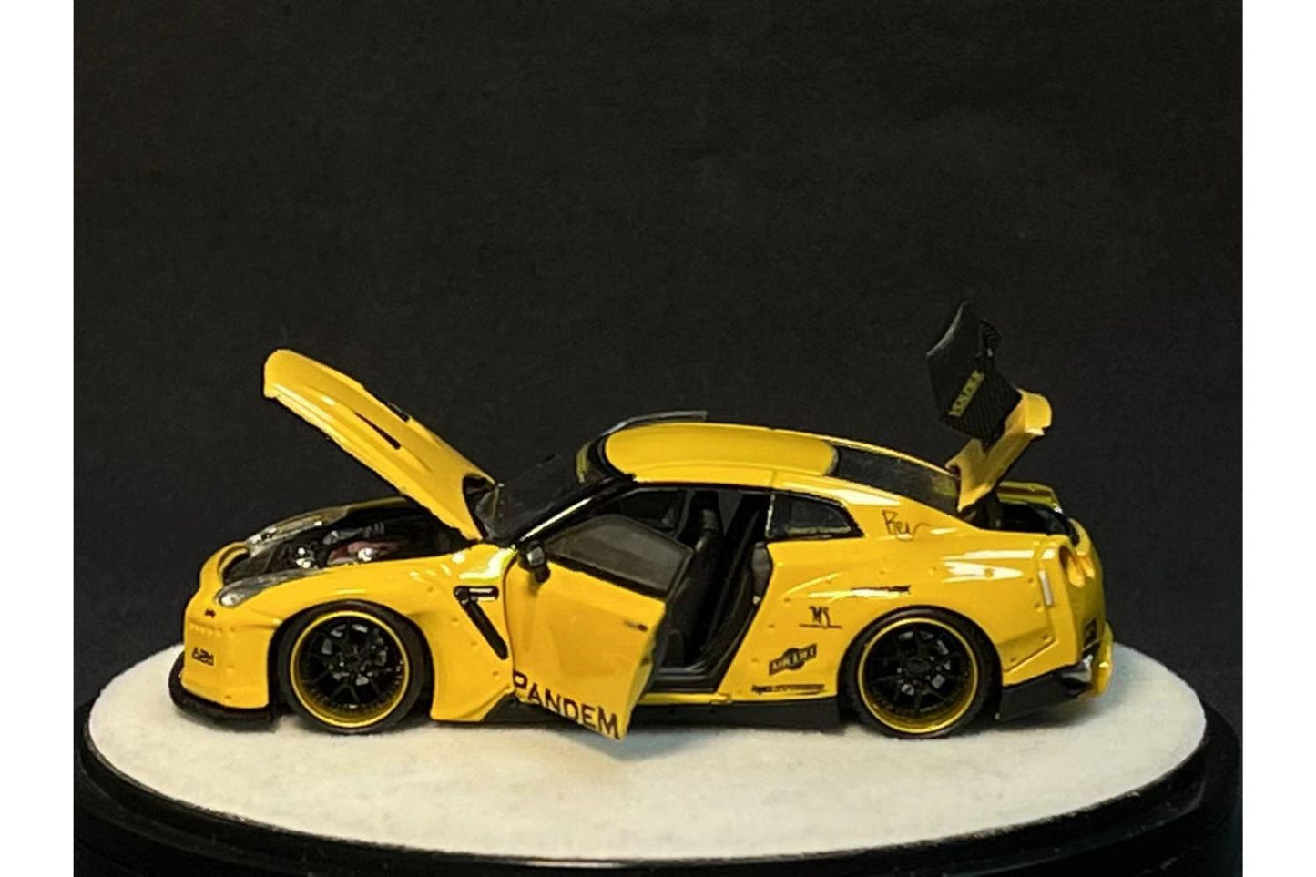 PGM 1:64 Pandem Rocket Bunny Nissan Skyline GT-R (R35) in Yellow Luxury Base