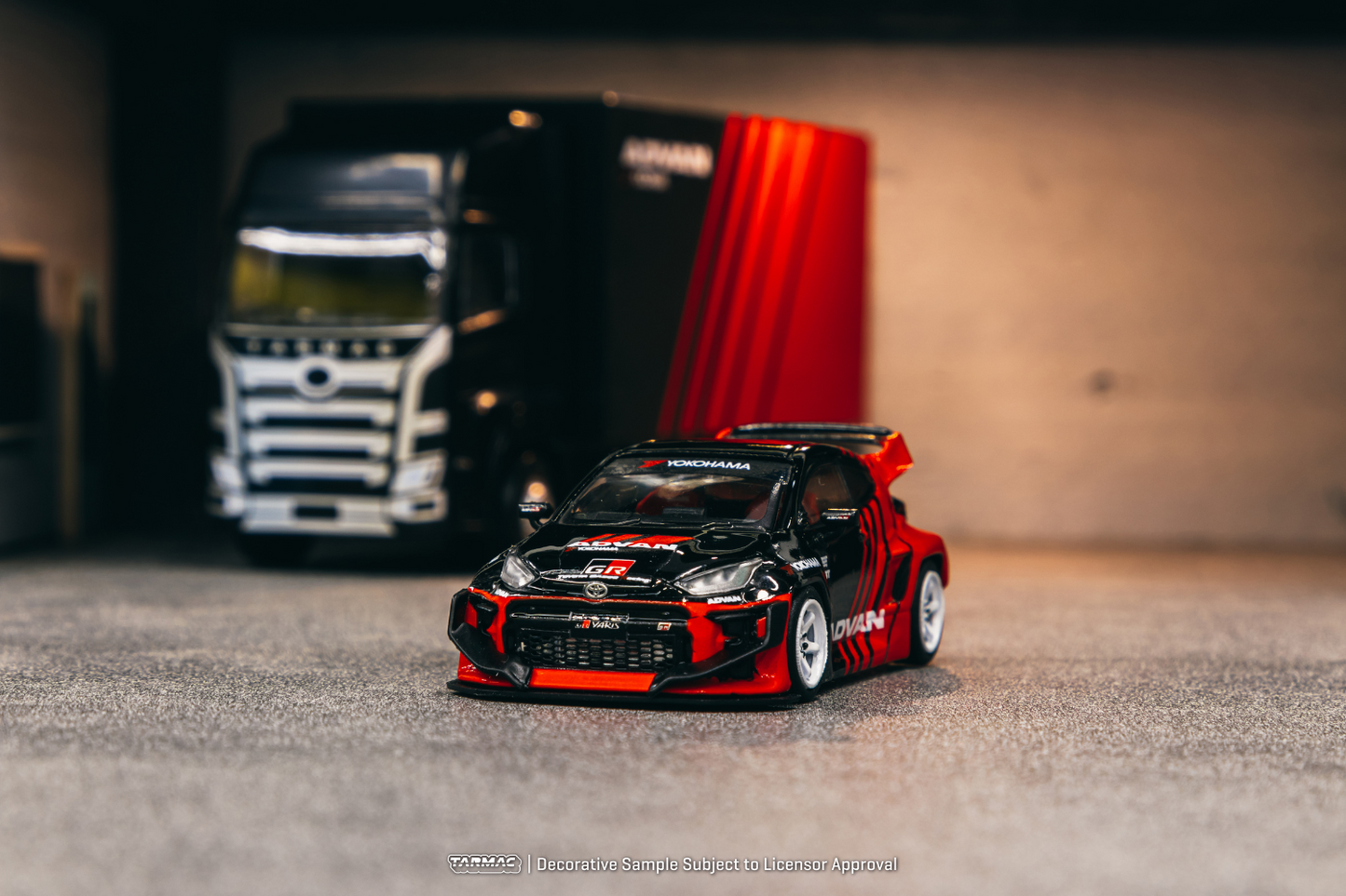 Tarmac Works 1/64 Rocket Bunny Toyota GR Yaris Pandem Wide Body in Advan Livery With Truck Packaging