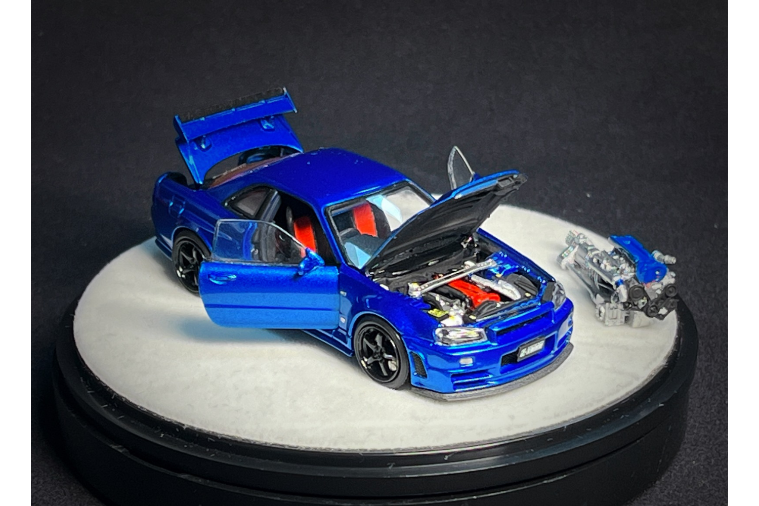 PGM x One Model 1:64 Nissan Skyline GT-R (R34) Z-Tune in Bayside PGM x One Model 1:64 Nissan Skyline GT-R (R34) Z-Tune in Bayside