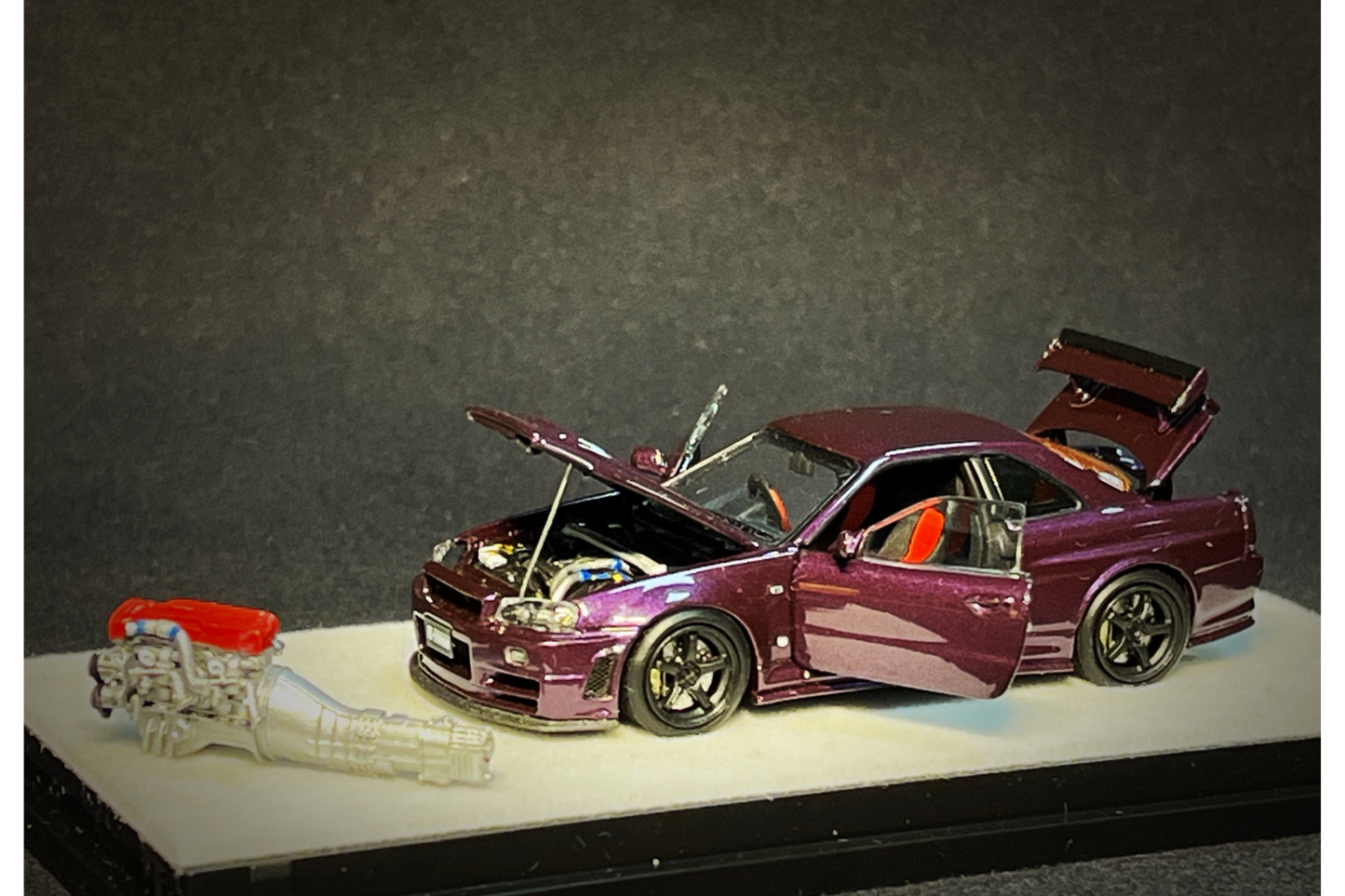 PGM x One Model 1:64 Nissan Skyline GT-R (R34) Z-Tune in Midnight Purple on Standard Base