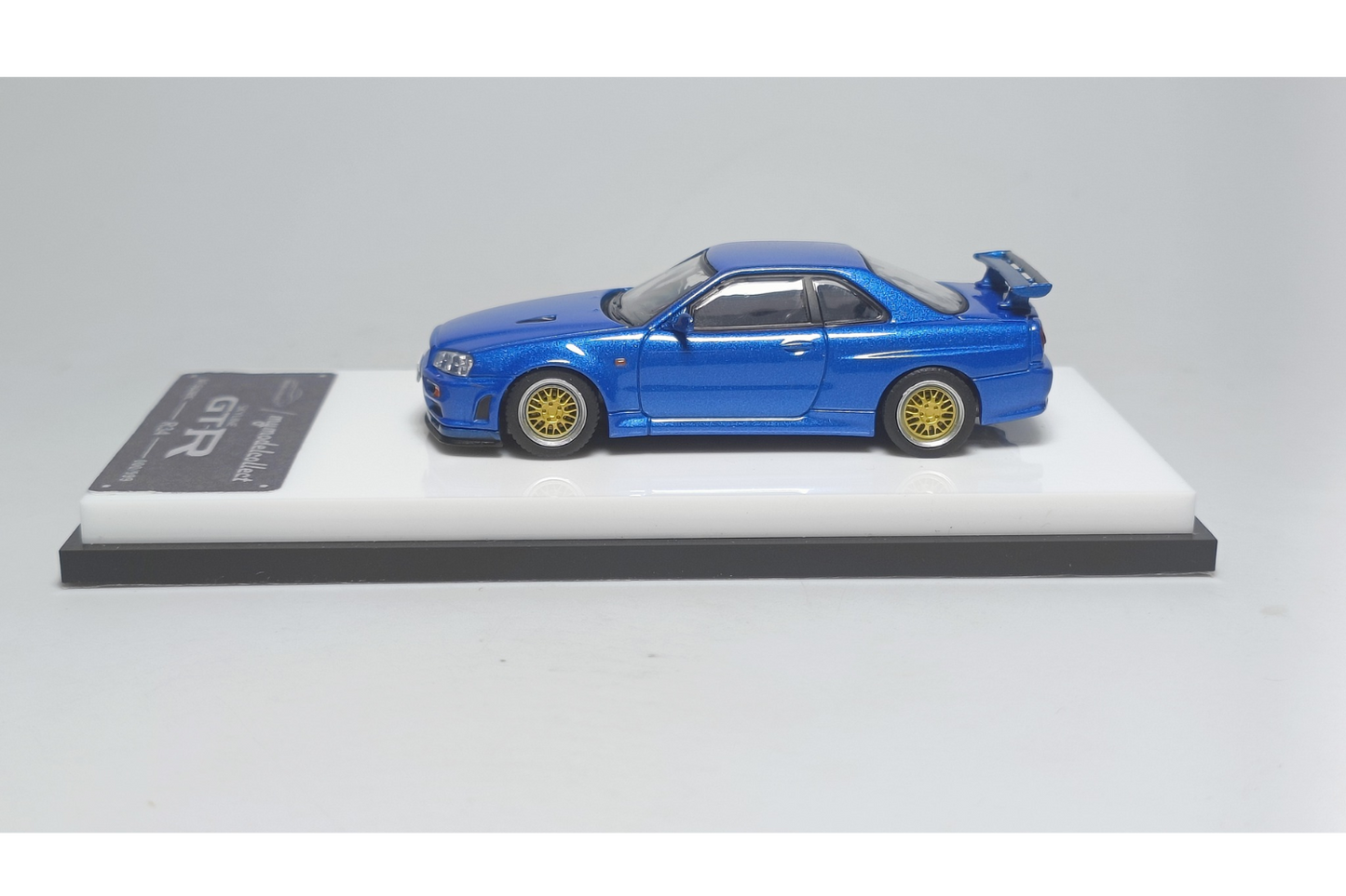 MC 1/64 Nissan Skyline GT-R V-Spec (R34) in Bayside Blue