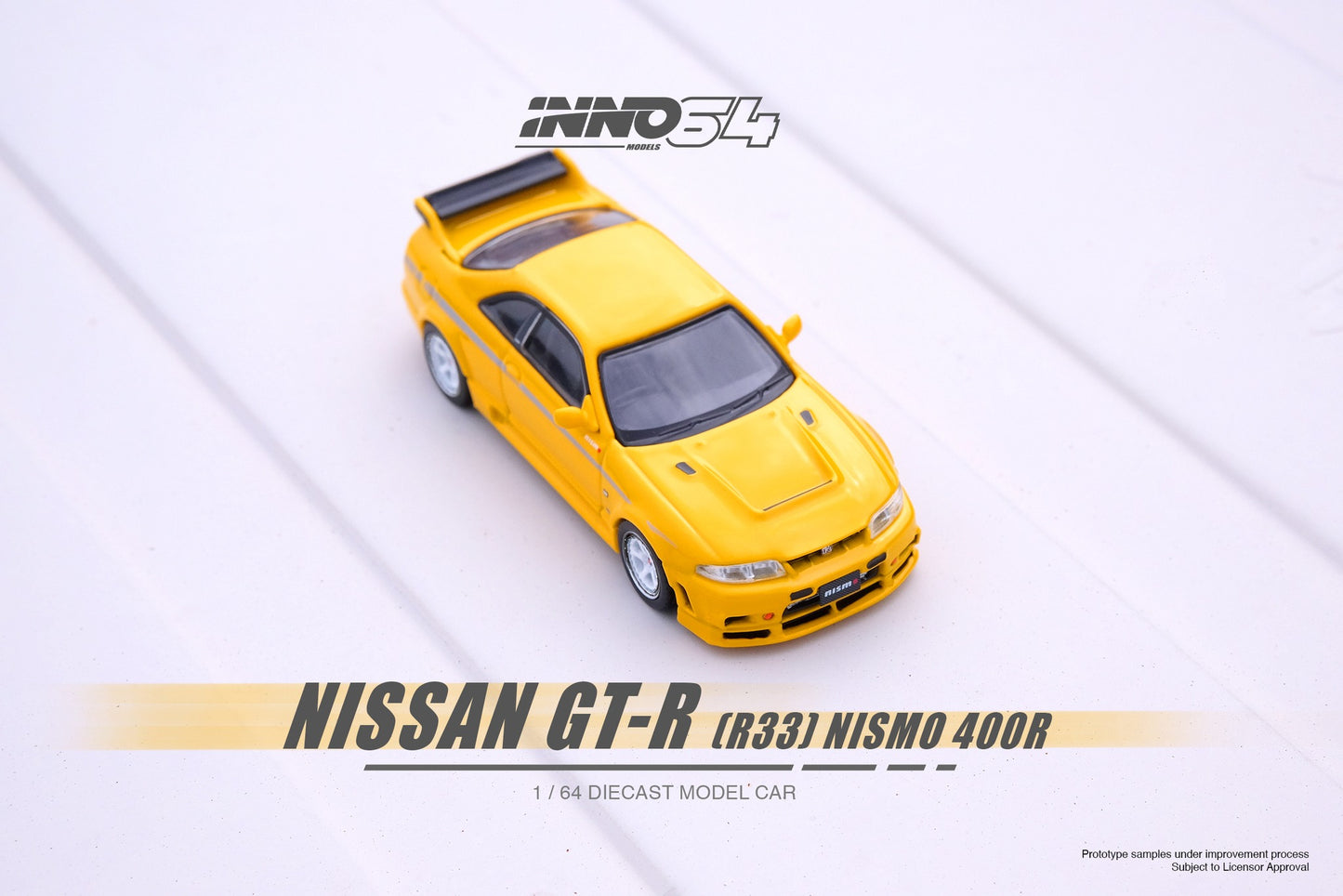 Inno64 Nissan Skyline GT-R (R33) Nismo 400R in Lightning Yellow