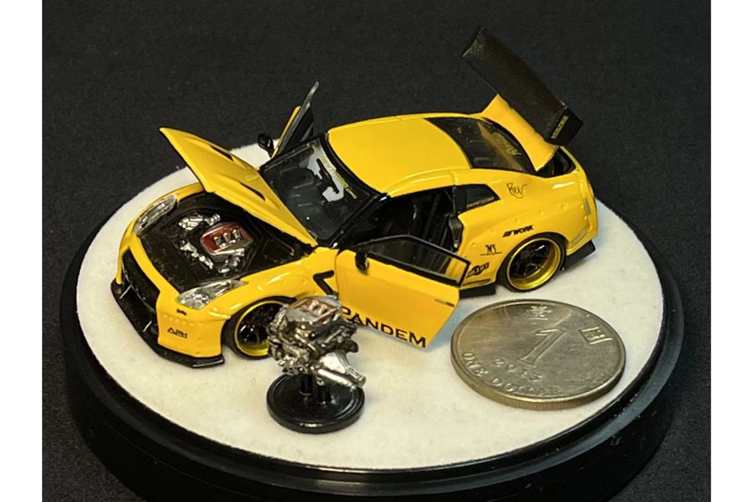 PGM 1:64 Pandem Rocket Bunny Nissan Skyline GT-R (R35) in Yellow Luxury Base