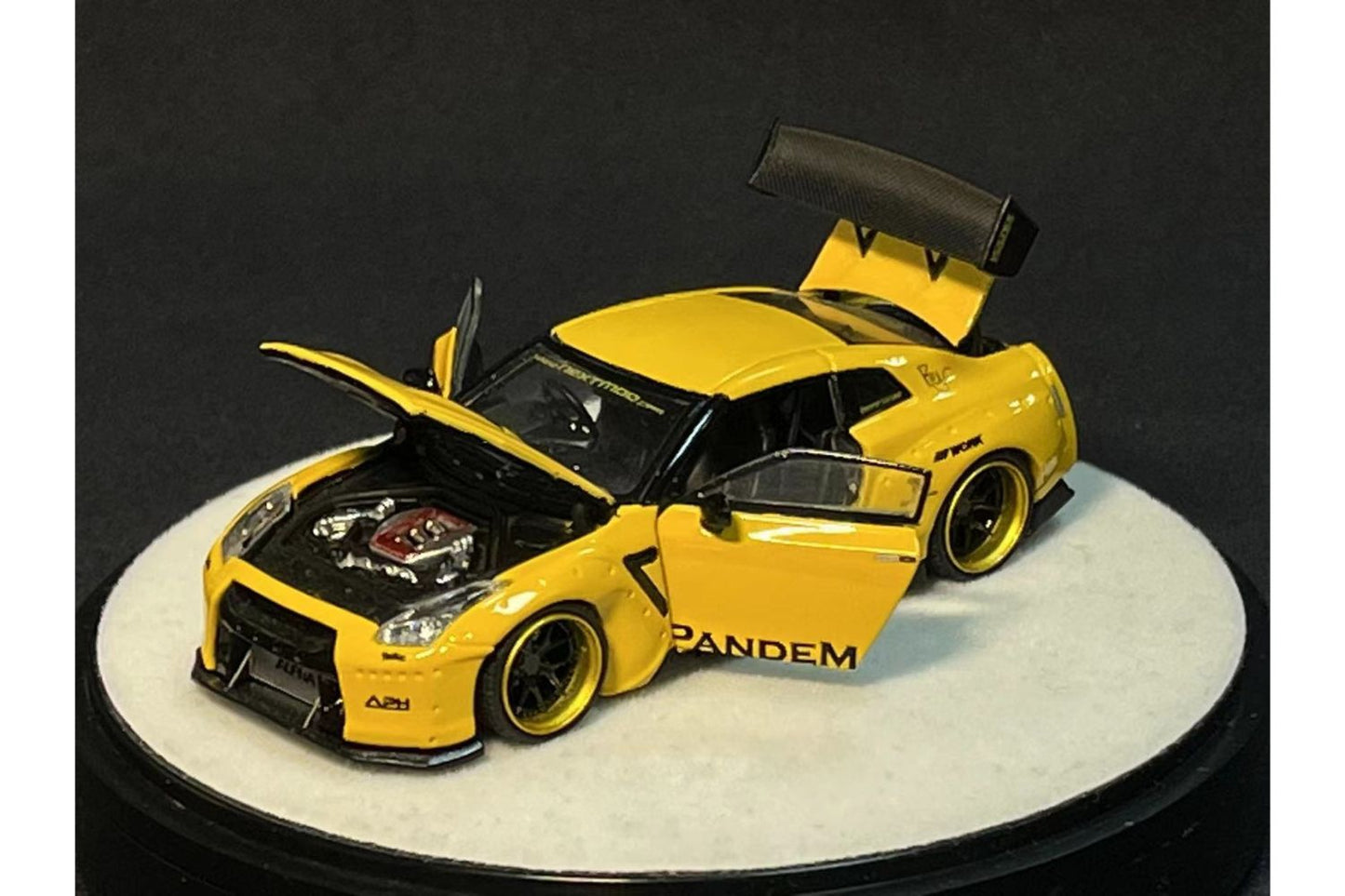 PGM 1:64 Pandem Rocket Bunny Nissan Skyline GT-R (R35) in Yellow Luxury Base