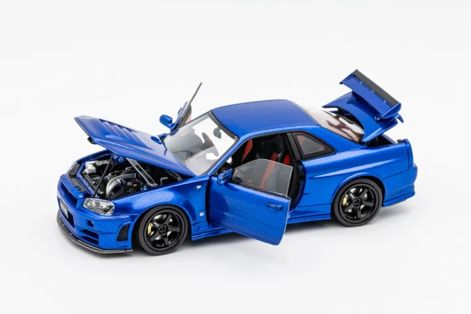PGM x One Model 1:43 Nissan Skyline GT-R (R34) Z-Tune in Metallic PGM x One Model 1:43 Nissan Skyline GT-R (R34) Z-Tune in Metallic
